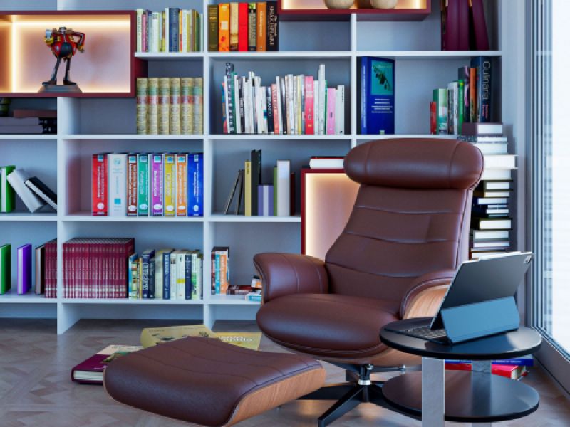 Infografía de sillón relax de cuero en habitación con gran biblioteca